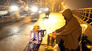 ປີ້ງສາລີ ຢູ່ ຮ່າໂນ້ຍ